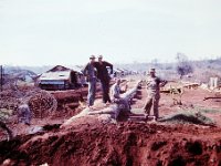 A few of the Cambodian Mercenaries who occupied the camp.  In the background is the housing for them, their wives, and children.